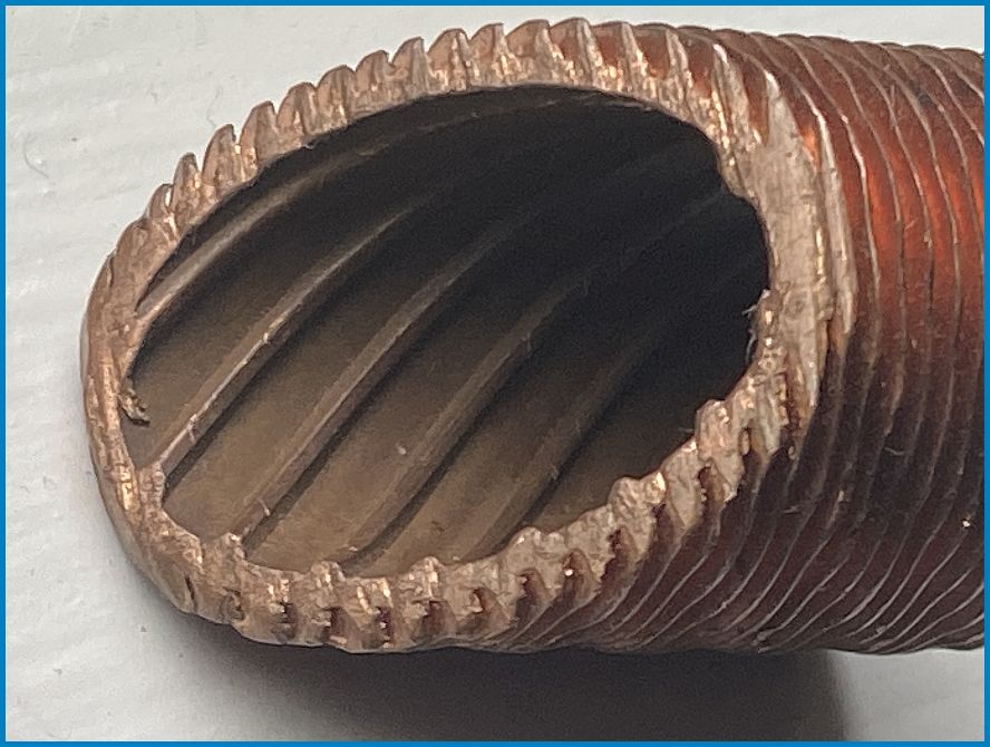 Copper heat exchanger pipe roughened both inside and out for heat transfer enhancement