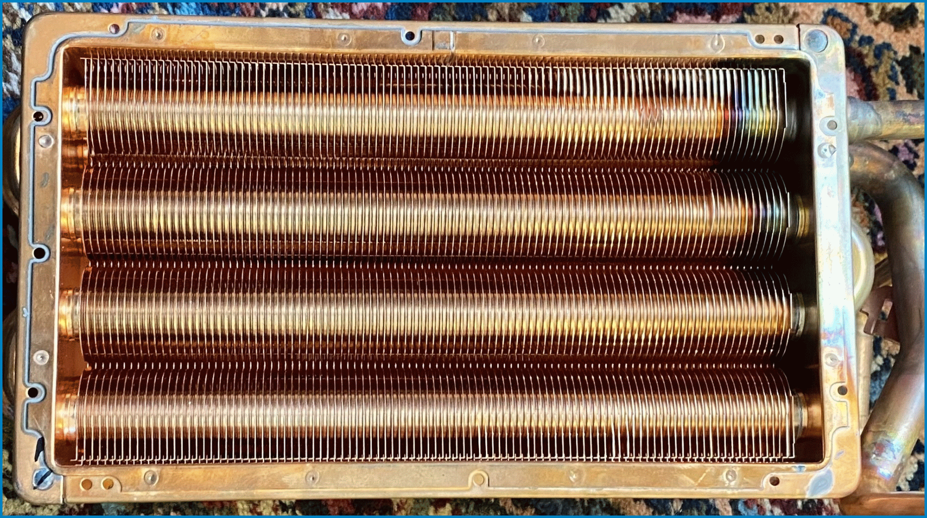 Cross-flow heat exchanger from a tankless water heater